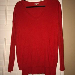 red v neck sweater